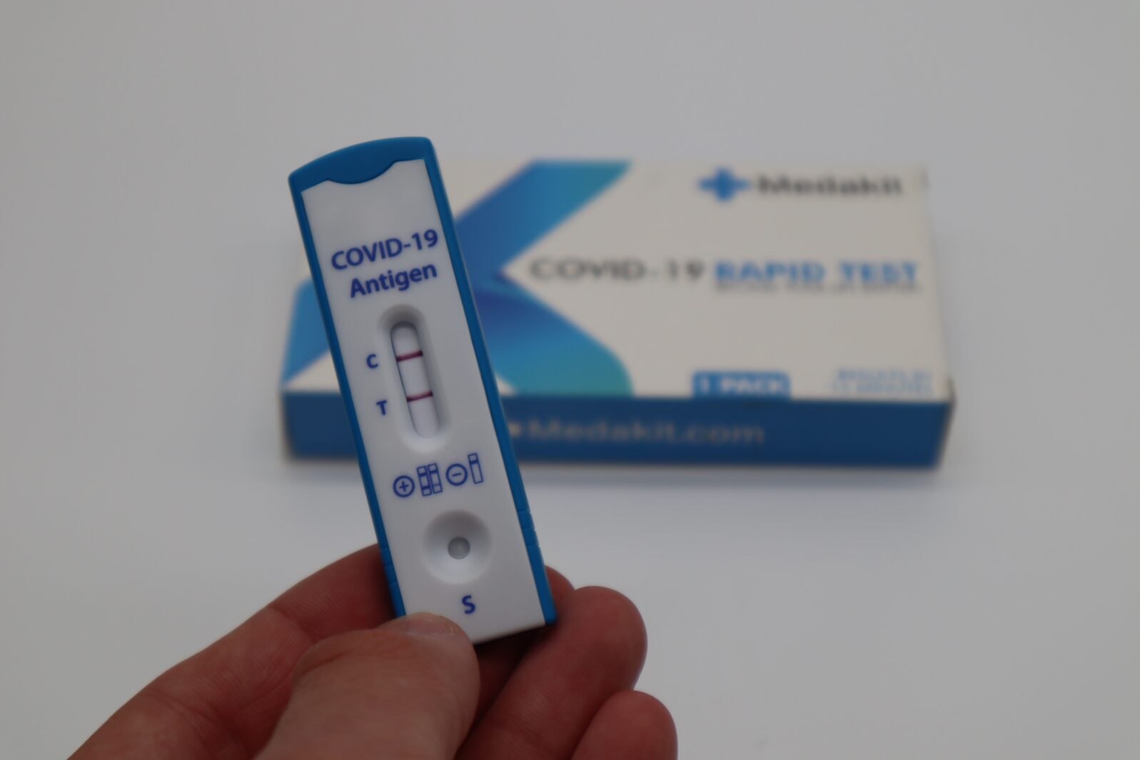 An image of a positive COVID rapid antigen test, which can result long COVID.